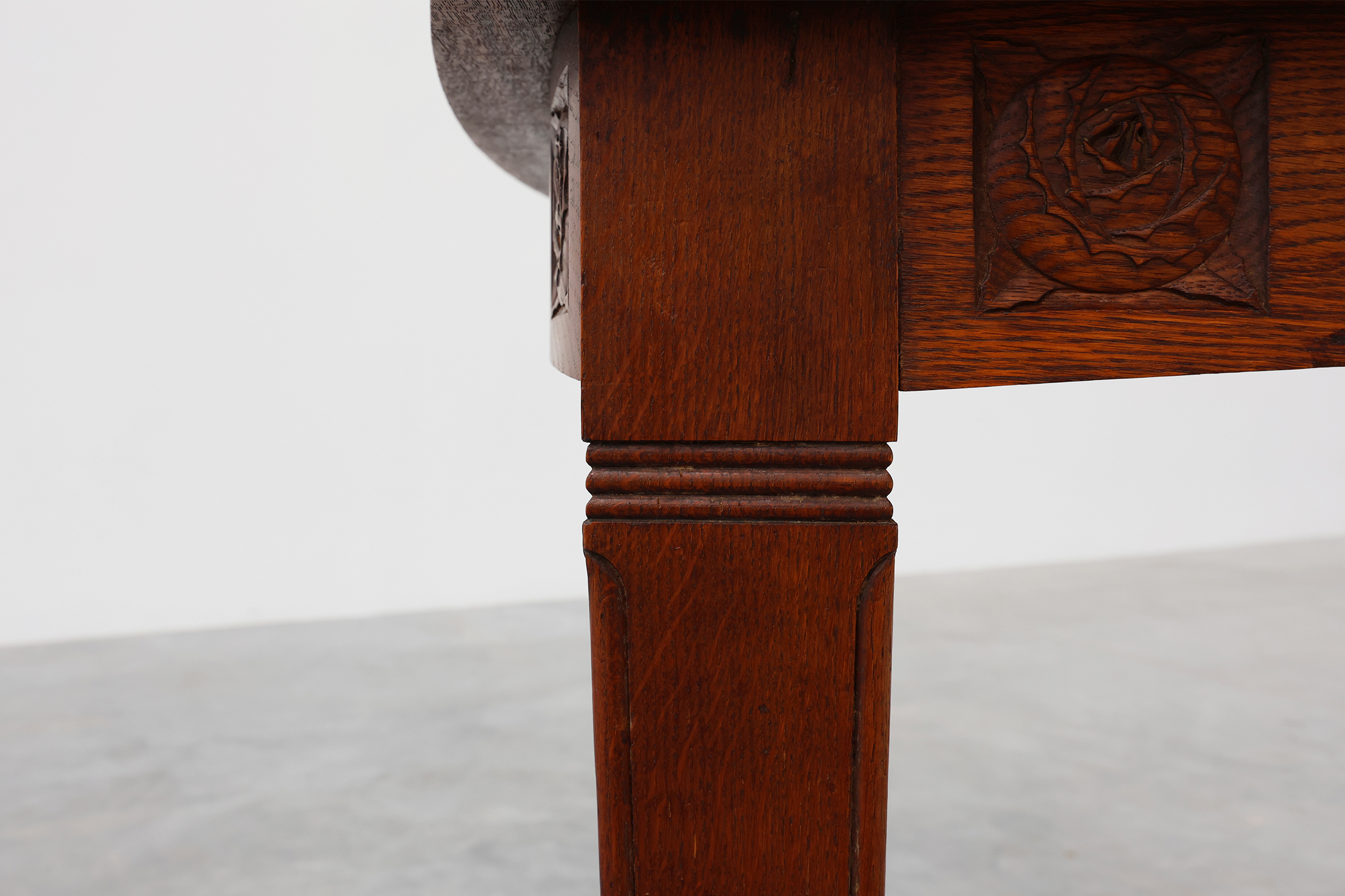 Oak Art Deco dining table with carved frieze, France 1920sthumbnail